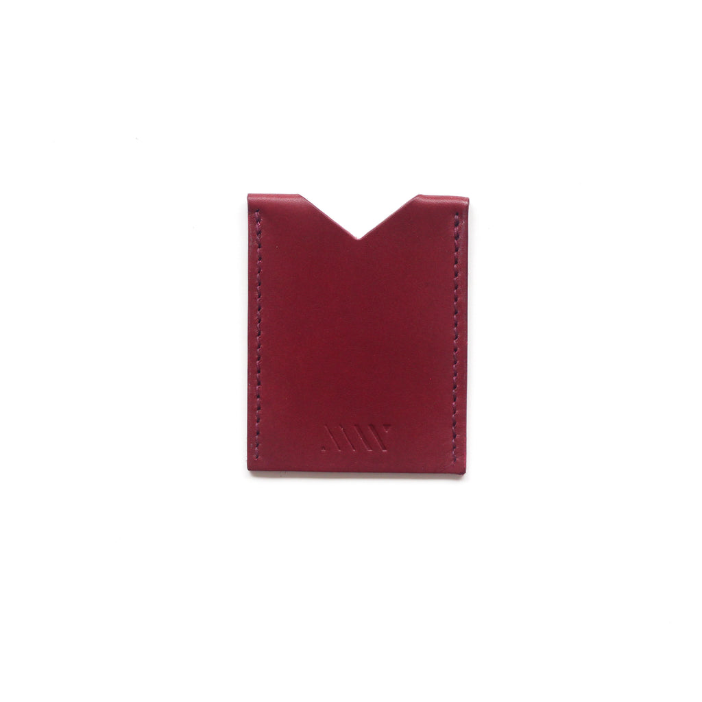 wine red leather card holder on a white background. 