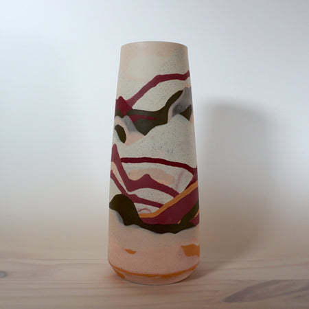 a marbled multi coloured vase