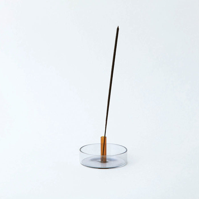 glass incense holder on a white background