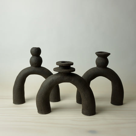 three leggy candlestick holders, handmade in black clay by HoodMor