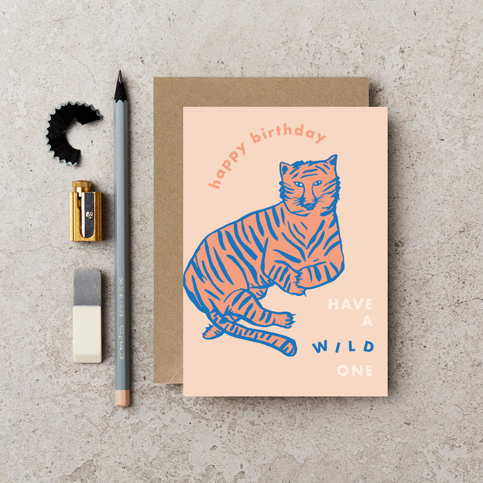 happy birthday card with a tiger that says have a wild one. 