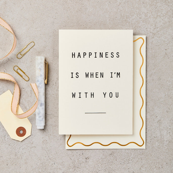 a simple card that reads - happiness is when im with you. 