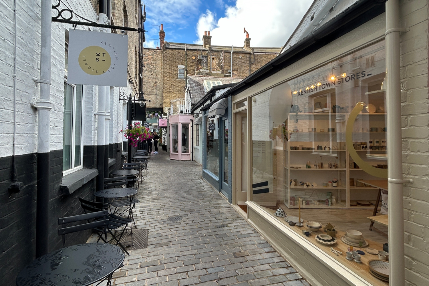 a courtyard of shops in the heart of Hampstead village. 