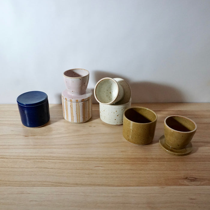 Mae Ceramics Butter Bells on a table. 
