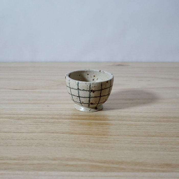 Mae Ceramics Handmade Egg Cup in grid pattern. 