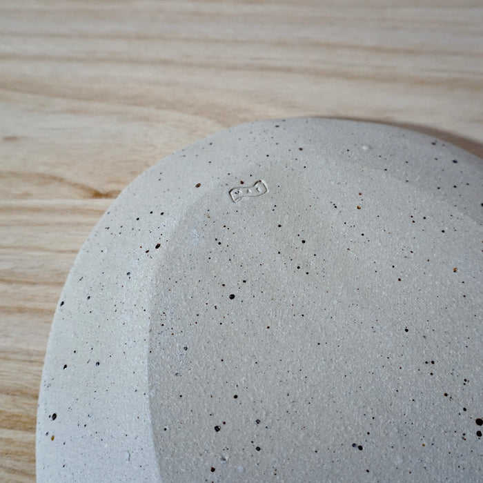 handmade oval platter back with makers mark by Mae Ceramics. 