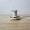 white handmade candlestick holder by Mae Ceramics. 