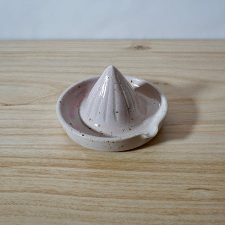 Pink coloured Lemon Squeezer handmade by Mae Ceramics. 
