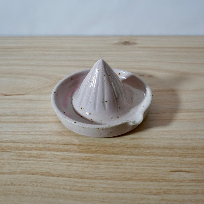 Pink coloured Lemon Squeezer handmade by Mae Ceramics. 