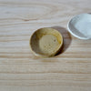 honey coloured tiny wonky dish by mae ceramics. 