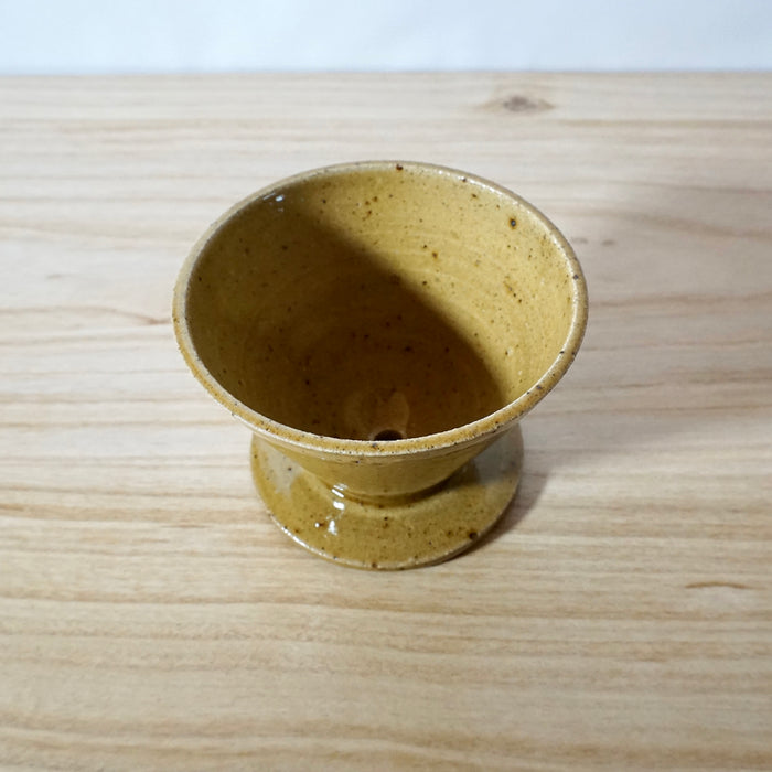 Mae Ceramics Honey glazed V60 coffee dripper for pour over coffee. 