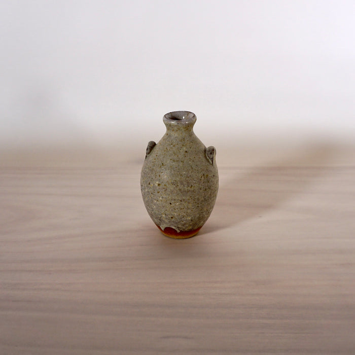 handmade bud vase in stoneware with an ash glaze by Lily Pearmain Ceramics. 