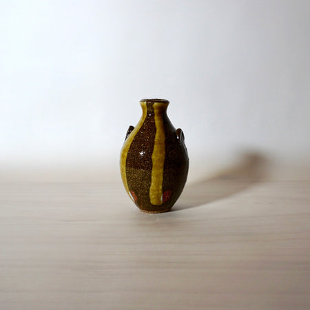 handmade bud vase in stoneware with striped slip decoration by Lily Pearmain Ceramics. 