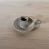 handmade candleholder with a handle in a white glaze by Lily Pearmain ceramics. 