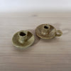 handmade candleholder with a handle and one without a handle, both in a speckled glaze by Lily Pearmain ceramics. 