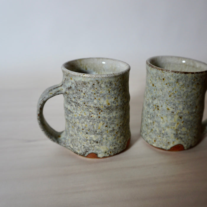 close up of a handmade espresso cup in an ash glaze by Lily Pearmain Ceramics. 