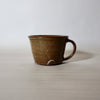 hand thrown mug by lily Pearmain ceramics in a iron rich glaze on a red clay