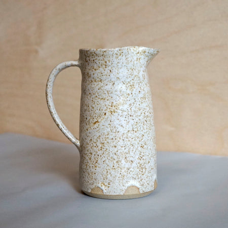 a speckled stoneware milk jug taken from the side. Speckled Milk Jug | Lily Pearmain | Kentish Town Stores