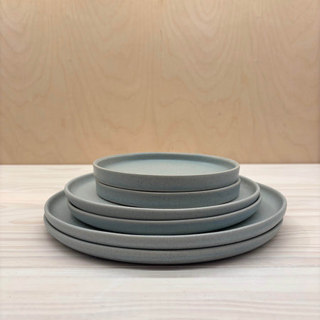 Stack of Linen Blue Plates by Dor & Tan