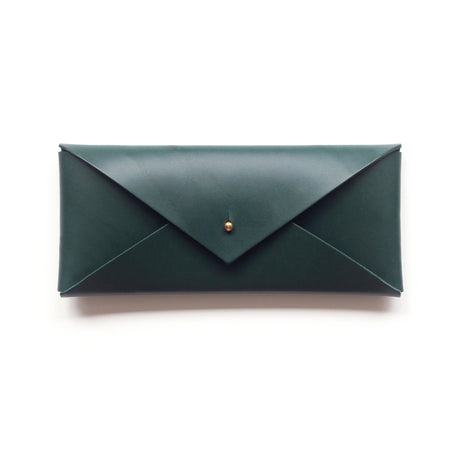 green leather envelope or glasses case on a white background. 