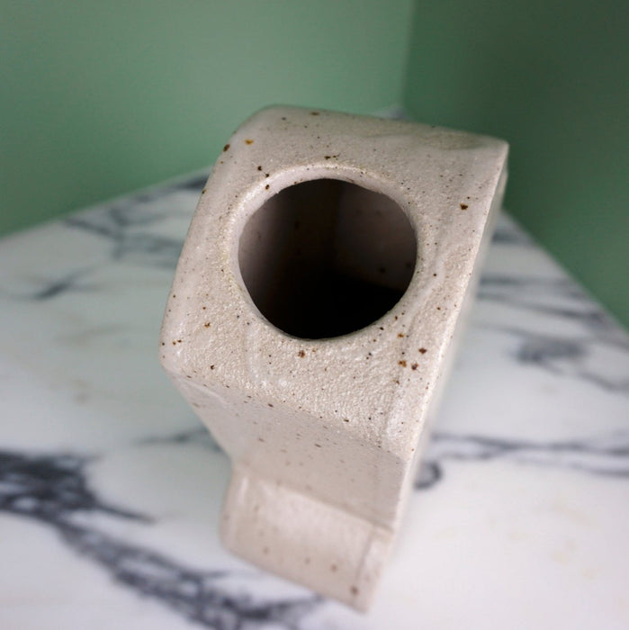 abstract shape slab built vase by Mae Ceramics. showing the close up of the neck. 