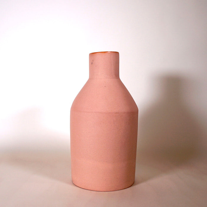 handmade pink bottle vase. 