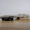 side angle of some handmade serving bowls. 