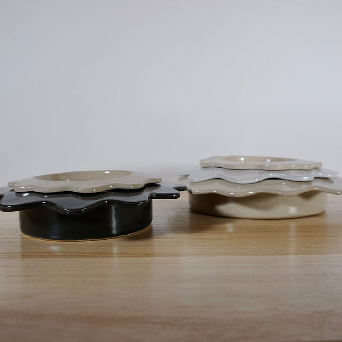 side angle of some handmade serving bowls. 