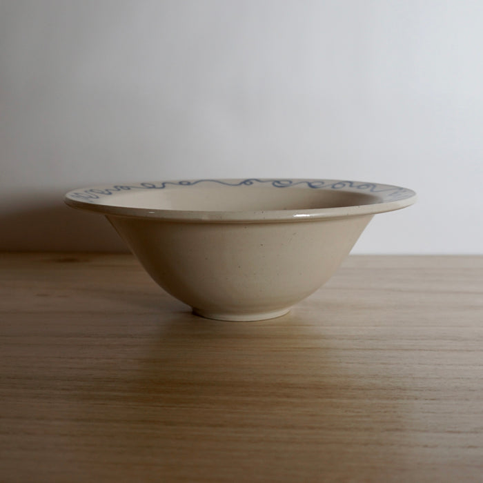 side view of a beautifully tapered pasta bowl. hand thrown by Studio ERS. 