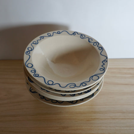 stack of 6 handmade pasta bowls with blue design by Studio ERS. 