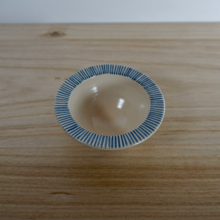 blue stripped handmade ceramic snack bowl. 